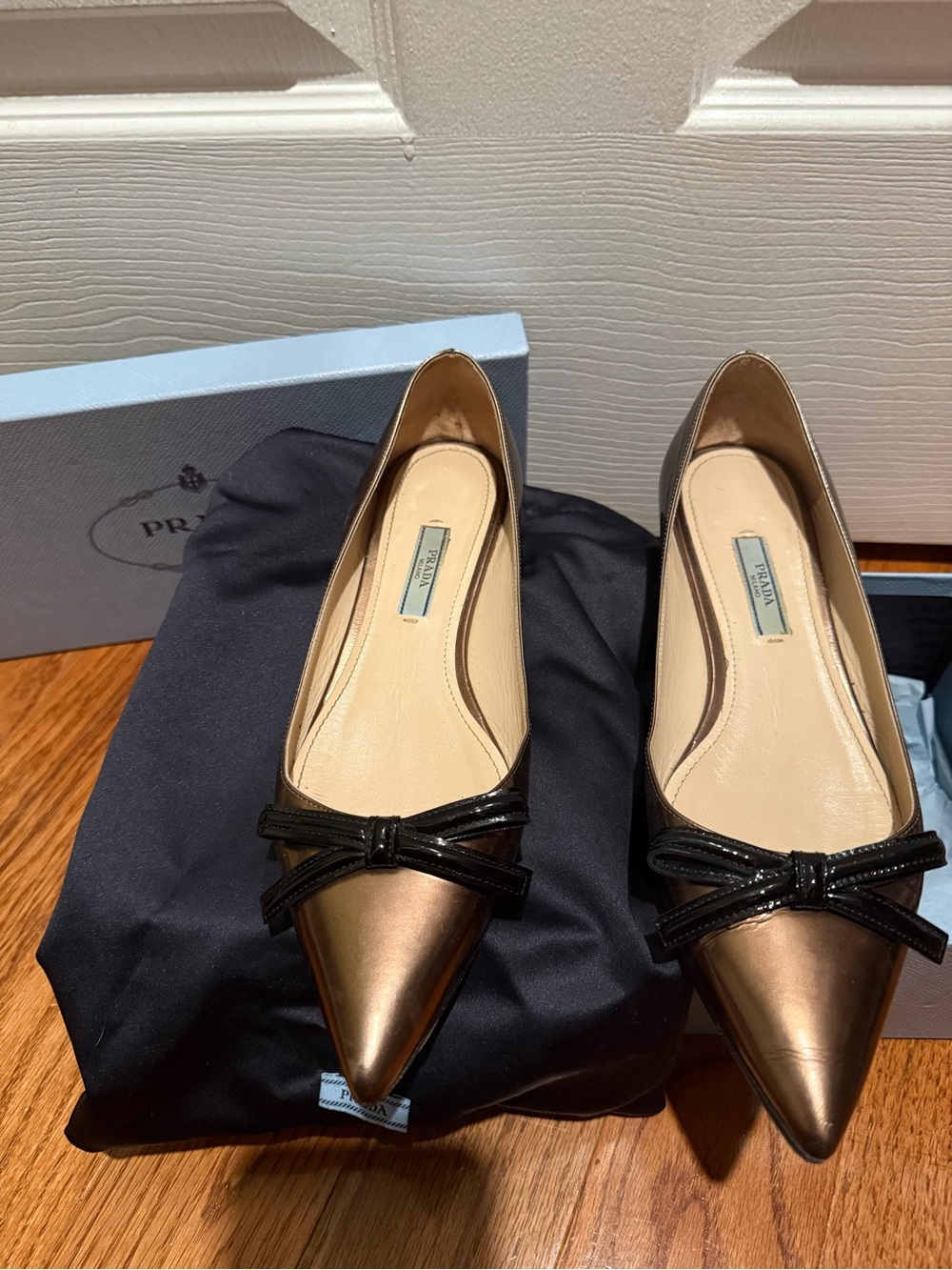 Prada Metallic Bronze Pointed Toe Flats with Black Bow